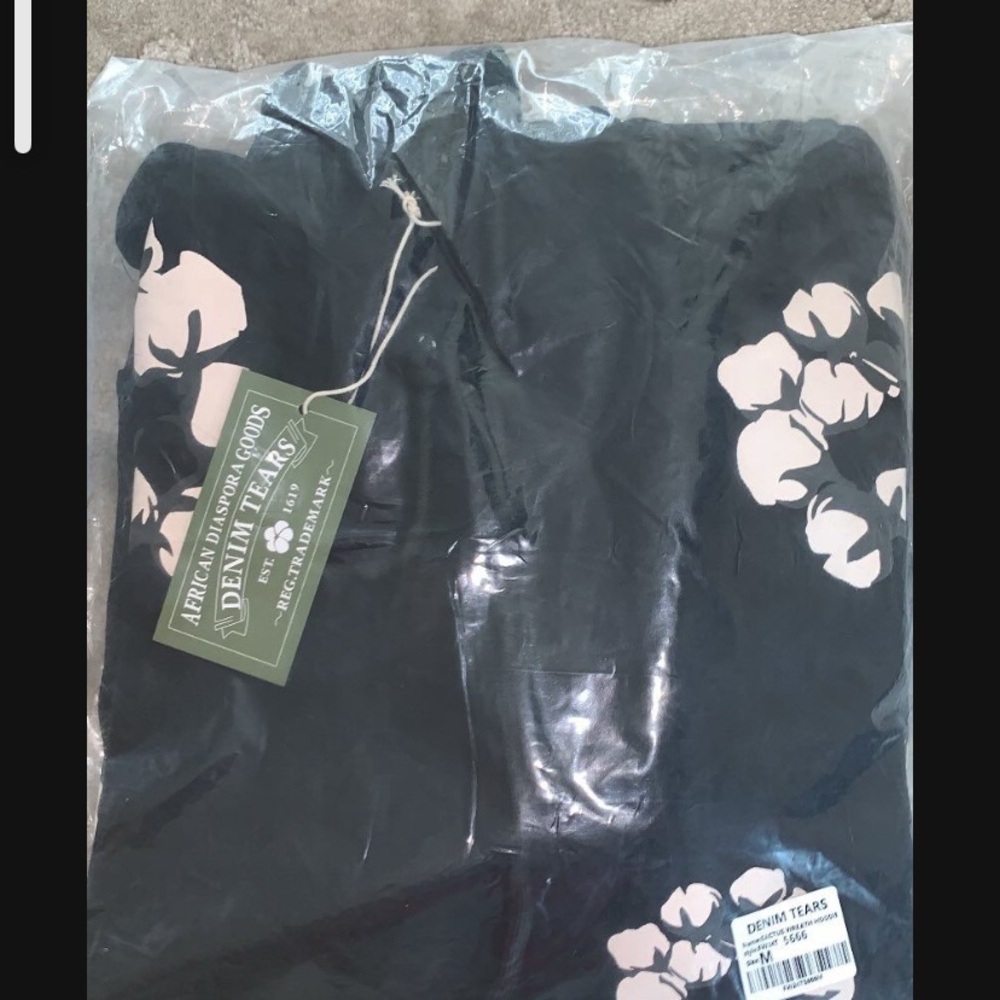 Denim Tears Black Sweater with Floral Design
